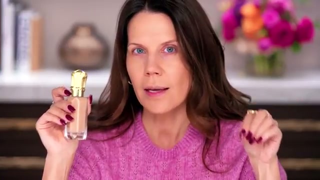 @tati reviewing Christian Louboutin Teint Fétiche Le Fluide at 04:21 in a YouTube Shorts video