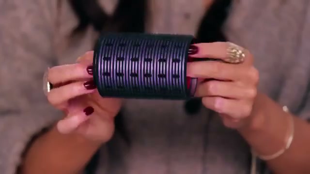 @tati reviewing DOM DOM Metal Hair Rollers at 15:46 in a YouTube Shorts video