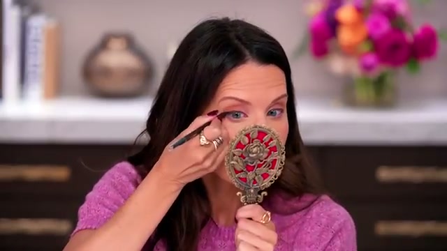 @tati reviewing Yves Saint Laurent Lines Liberated 24H Waterproof Eyeliner at 15:36 in a YouTube Shorts video