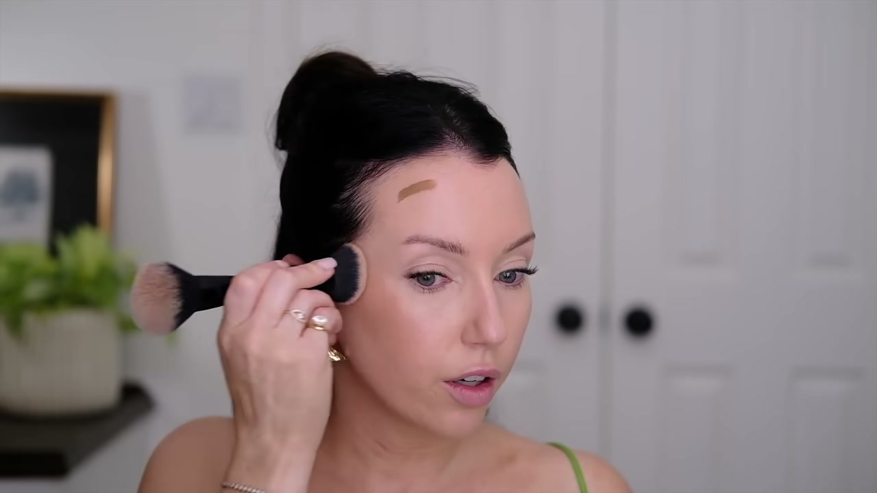 @taylorwynn reviewing e.l.f. Cosmetics Camo Liquid Bronzer at 14:08 in a YouTube Shorts video