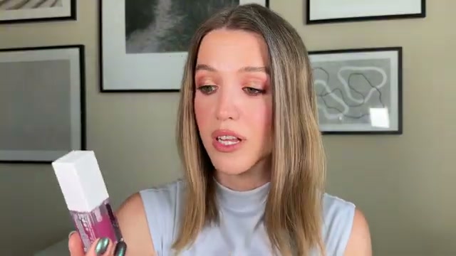 @theelenakoira reviewing Catrice Tinted Lip Oil at 18:16 in a YouTube Shorts video