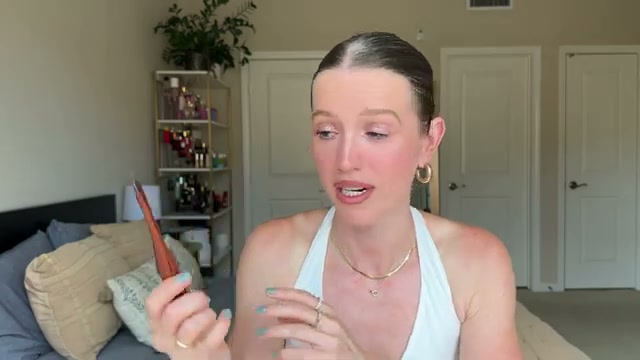 @theelenakoira reviewing Danessa Myricks Beauty Yummy Skin Serum Skin Tint at 07:01 in a YouTube Shorts video