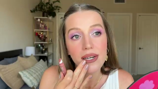 @theelenakoira reviewing Huda Beauty Soft Blur Lip Cream at 22:29 in a YouTube Shorts video