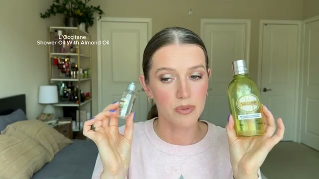 @theelenakoira reviewing L'Occitane Shower Oil at 05:38 in a YouTube Shorts video