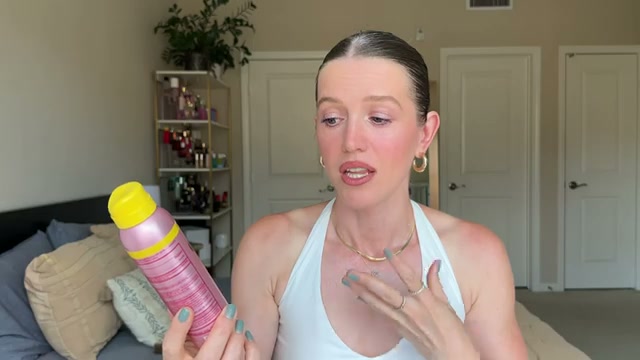 @theelenakoira reviewing One/Size Until Dawn Mattifying Sunscreen Makeup Setting Spray SPF 28 at 14:30 in a YouTube Shorts video