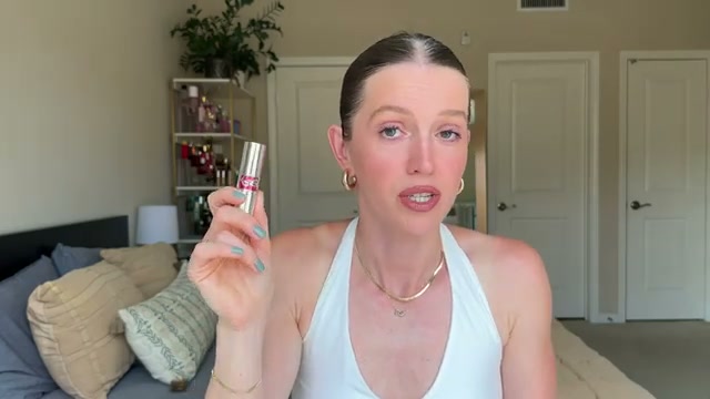 @theelenakoira reviewing Yves Saint Laurent Candy Glaze at 28:07 in a YouTube Shorts video