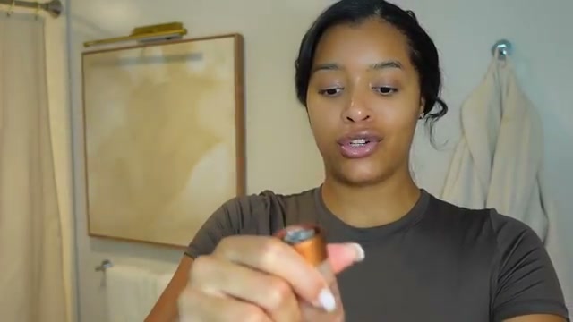 @thekylesisters reviewing Danessa Myricks Beauty Yummy Skin Water Powder Serum at 05:27 in a YouTube Shorts video