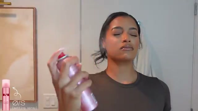 @thekylesisters reviewing One/Size Setting Spray at 41:56 in a YouTube Shorts video