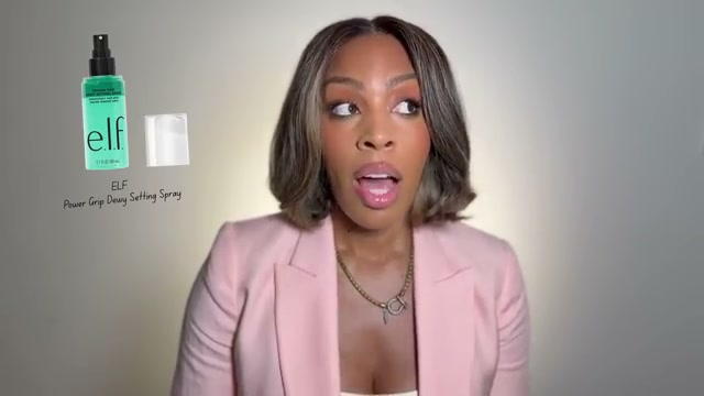 @tiffanylumpkintv reviewing e.l.f. Cosmetics Power Grip Dewy Setting Spray at 19:16 in a YouTube Shorts video