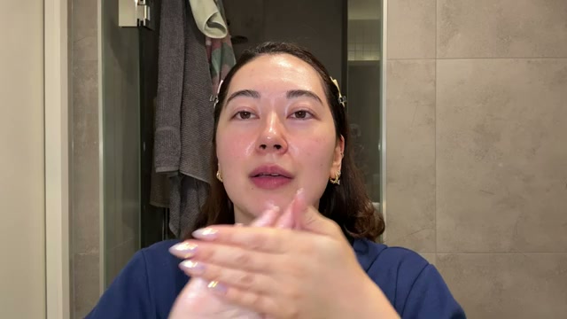 @tinatanakaharris reviewing ALPHA-H Golden Haze Face Oil at 22:00 in a YouTube Shorts video