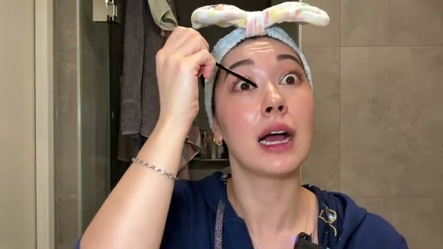 @tinatanakaharris reviewing Cosparade Mascara Remover at 12:23 in a YouTube Shorts video