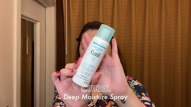 @tinatanakaharris reviewing Curél Deep Moisture Spray at 12:17 in a YouTube Shorts video