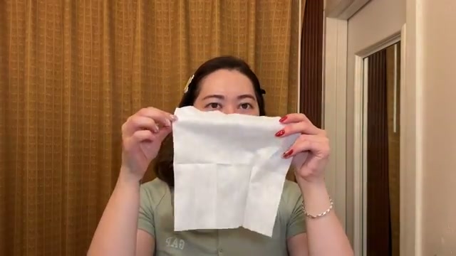 @tinatanakaharris reviewing ITO Disposable Cleansing Towel at 05:02 in a YouTube Shorts video