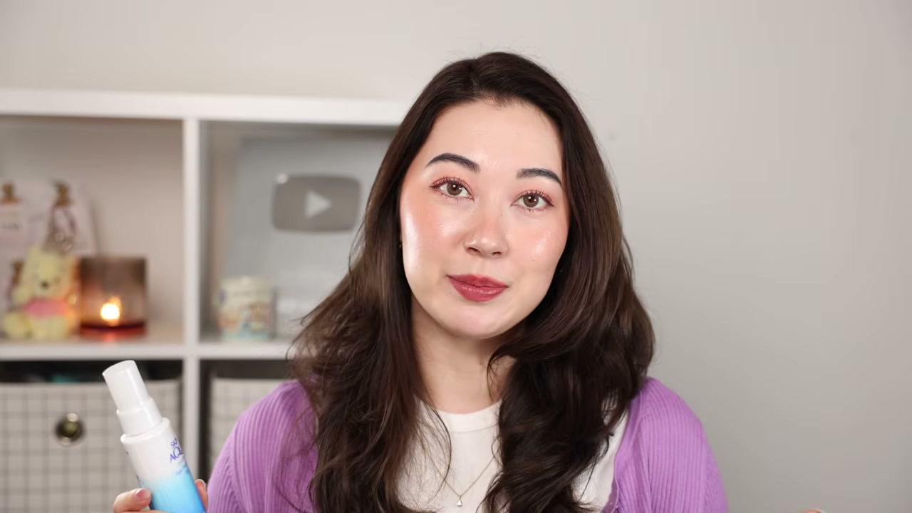 @tinatanakaharris reviewing Skin Aqua Super Moisture UV Mist at 12:36 in a YouTube Shorts video