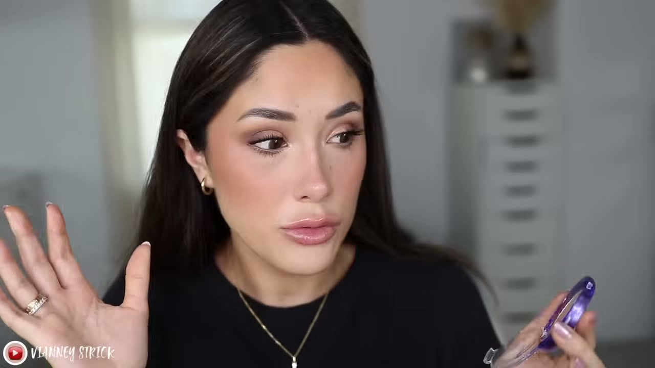 @vianneystrick reviewing Kosas Shiny Objects Wet Glisten Highlighter Powder for Face and Eyes at 16:11 in a YouTube Shorts video