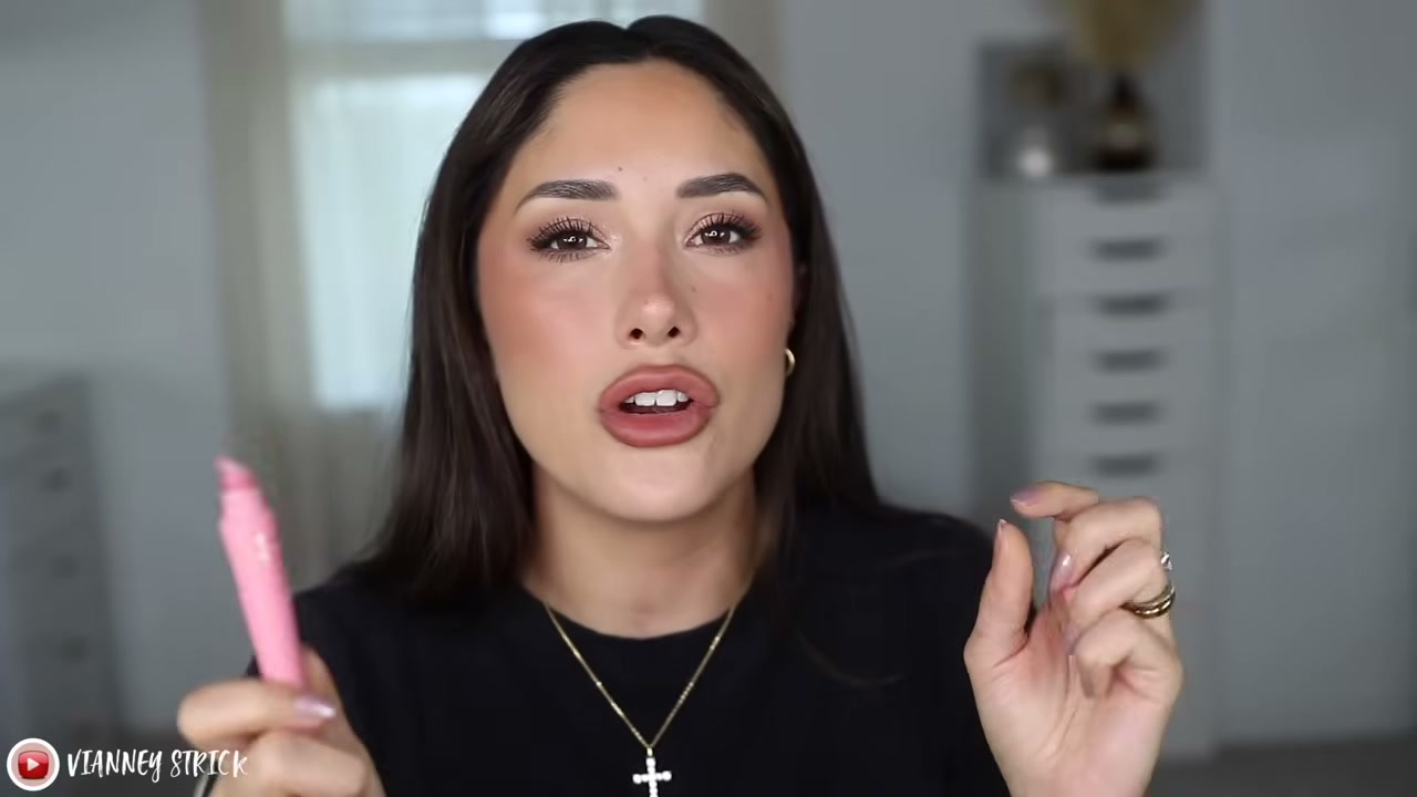 @vianneystrick reviewing Patrick Ta Major Moisture Smoothing Lip Balm at 20:59 in a YouTube Shorts video