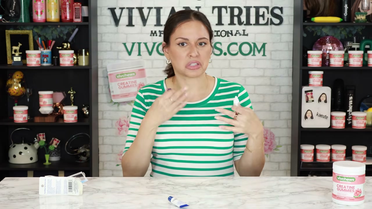 @vivian_tries reviewing Aquaphor Lip Repair at 13:25 in a YouTube Shorts video