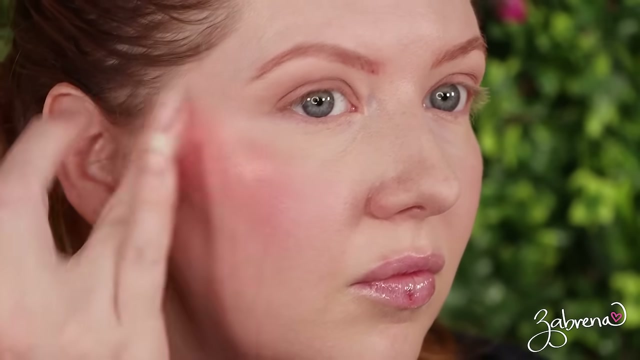 @zabrena reviewing Nude by Nature Dewy Serum Liquid Blush at 05:13 in a YouTube Shorts video